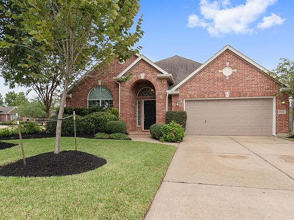 Gorgeous updated David Weekly Home on an Upgraded Corner Lot...