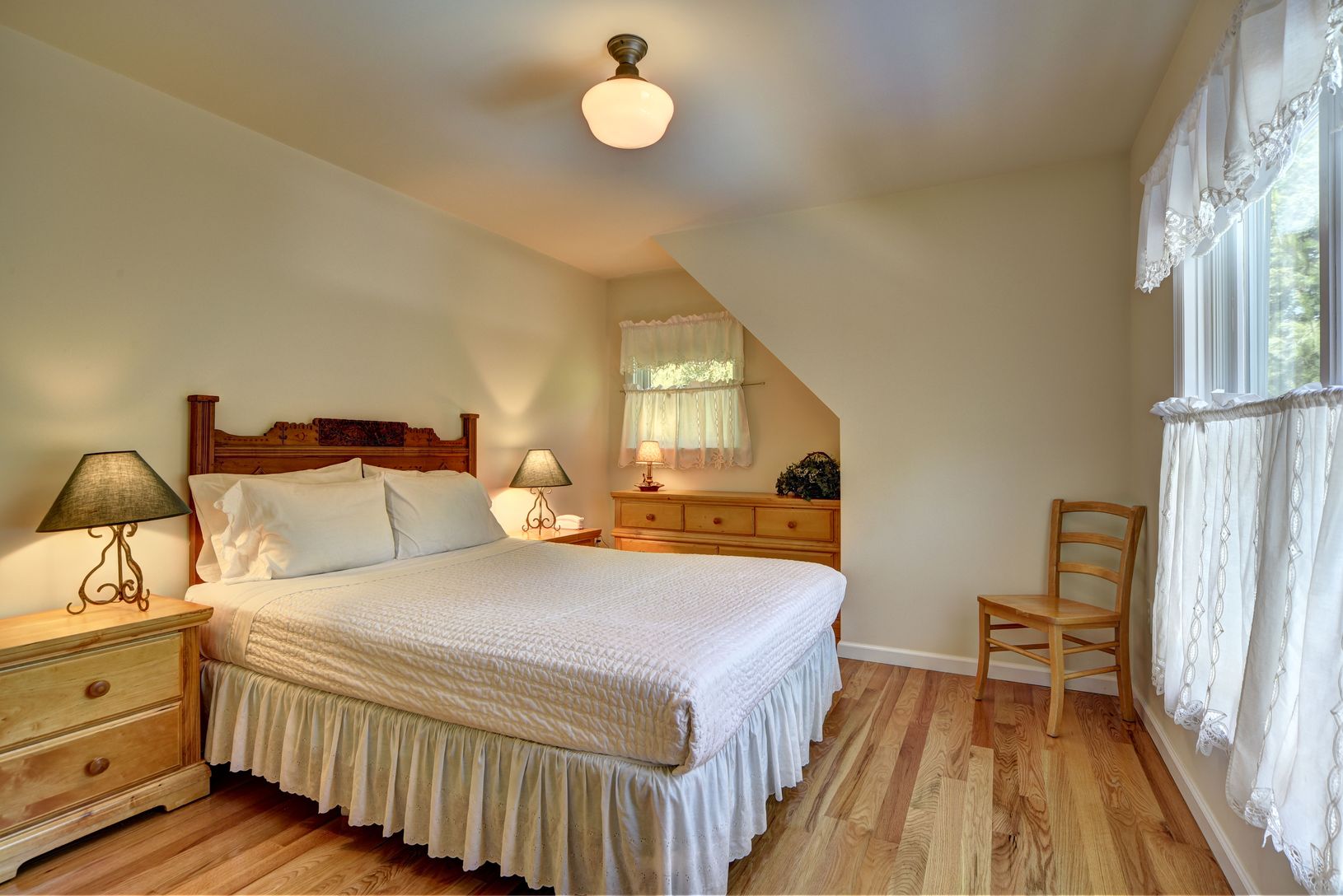  Second floor queen bedroom with view of the pool
