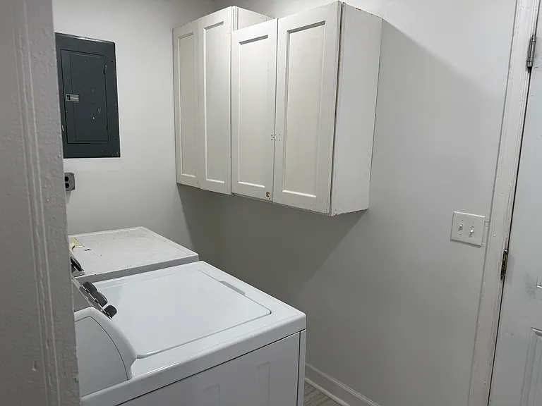 Laundry room with outside access