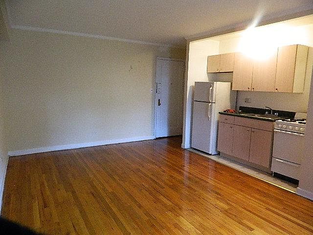 entry,part of living area and kitchen