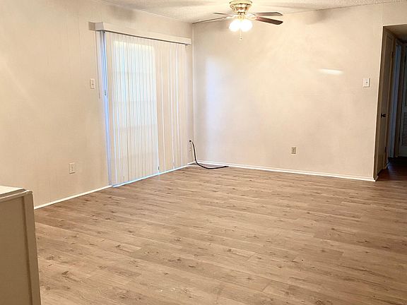 Living room and dining room open floor plan. Patio access off of dining room, expands your living space.