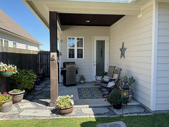 Beautiful, covered back patio area perfect for morning coffee or evening chats.