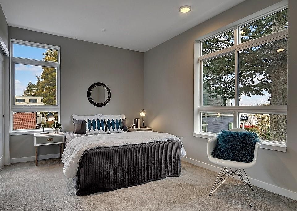 Bedroom with Ample Lighting