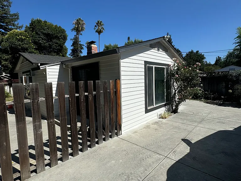 Front of house. Additional space for parking 4+ cars not pictured to right of concrete slab.