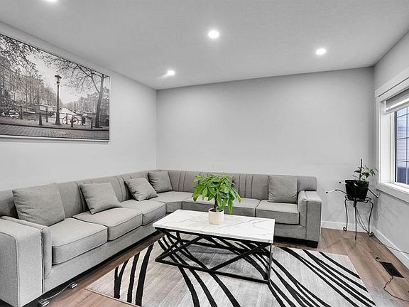 3rd image of 63 N Saddlemont Cres NE