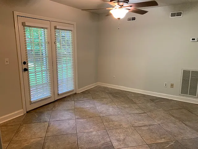 Downstairs bonus room that opens on to patio
