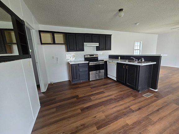 2nd image of 1421 Cody Rd N Lot 35