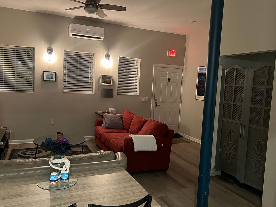 Living room with couch and love set, end table and coffee table