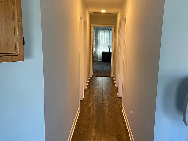 Upstairs hallway - bathroom and laundry room on the left; two rooms on the right; master bedroom straight