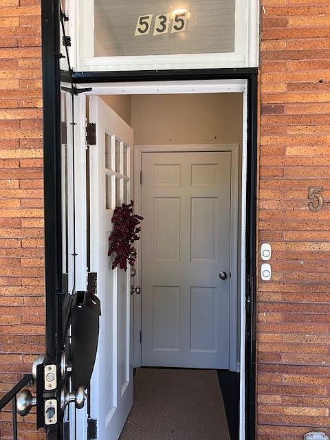 front door and foyer to basement unit