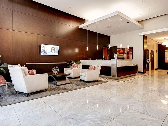 Front desk lobby with concierge, package service, mailrooms and lounge.