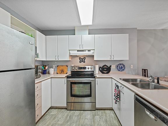 2nd image of 12160 80th Ave #211