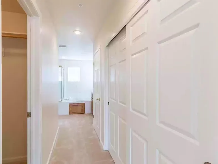 Mstr bed to bath hallway