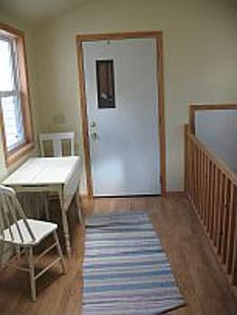 This 11.8 x 9.3 breezeway from the garage into the kitchen of this home is a wonderful feature,there