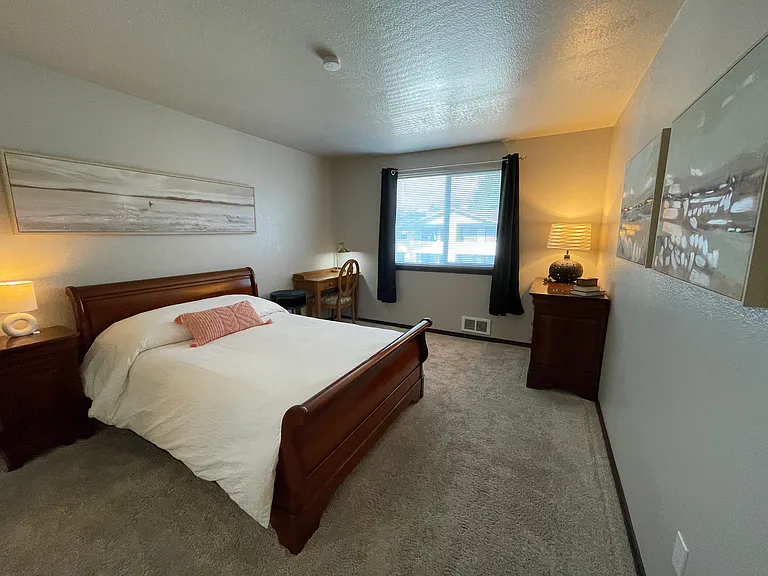 sample primary bedroom with furniture