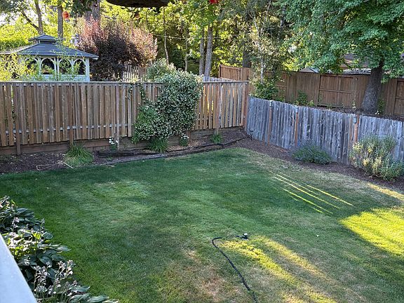Fenced private backyard.