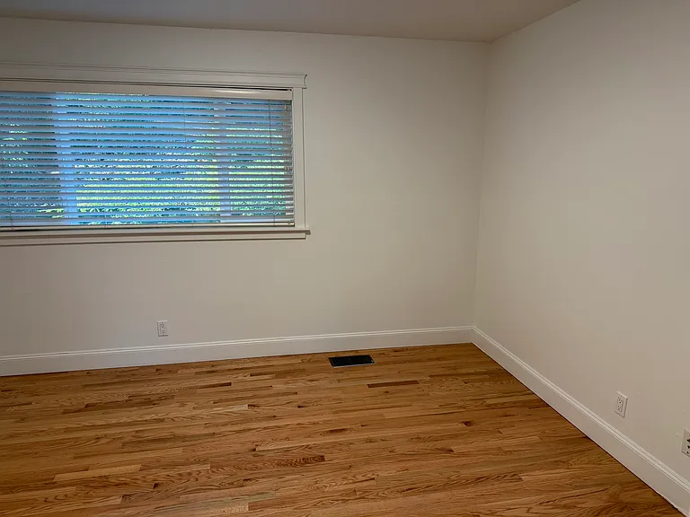 Master bedroom entrance view of first window