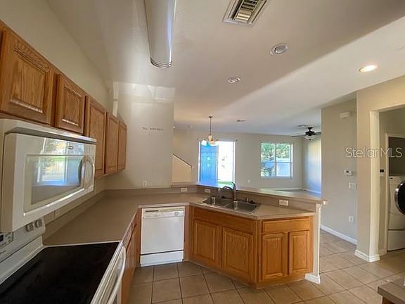 5th image of 4890 Battaglia Blvd
