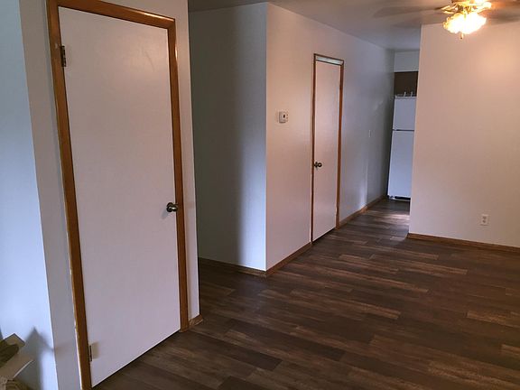 dining room with view into kitchen. View of coat closet and