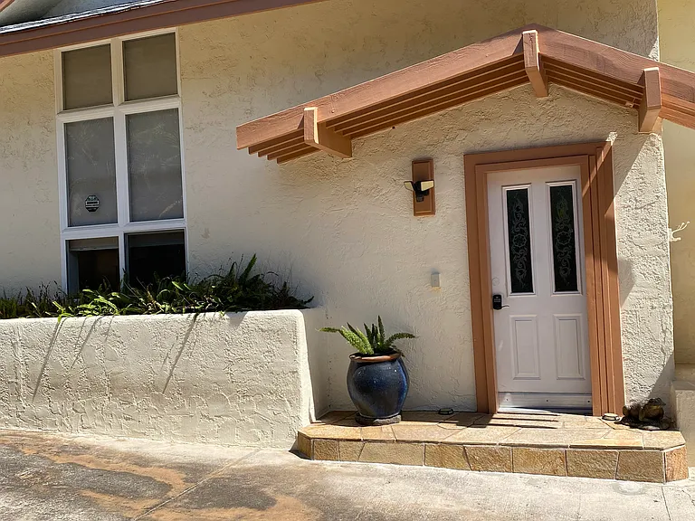 ENTRANCE INTO TWO STORY OHANA COTTAGE.