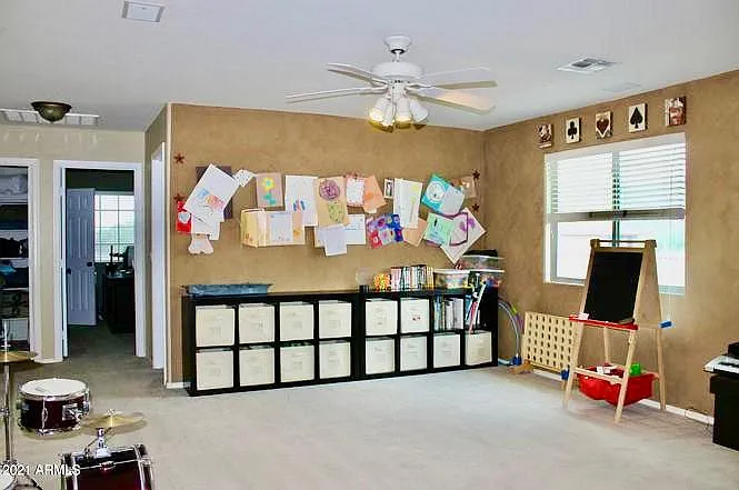 Upstairs loft area can be used as a play room, additional office or second living room (walls have been painted and carpet replaced since this picture was taken)