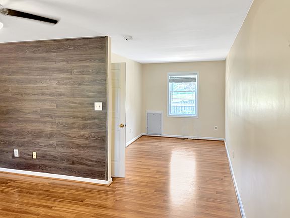Ground floor bedroom, office nook and dog door to back deck