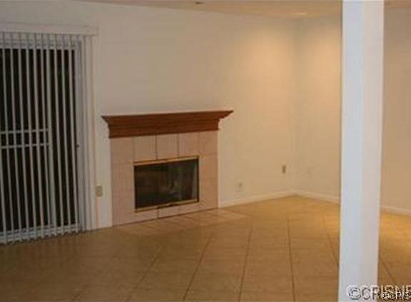 Sliding door to your private yard space, fireplace