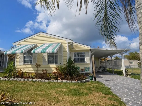 1027 Oriole Cir, Barefoot Bay, FL 32976