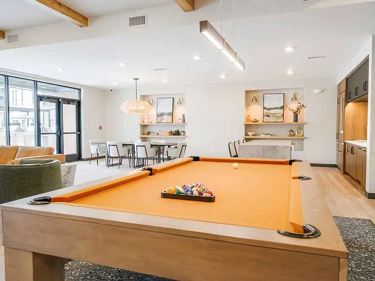 Challenge friends to a game of billiards in our vibrant clubroom.