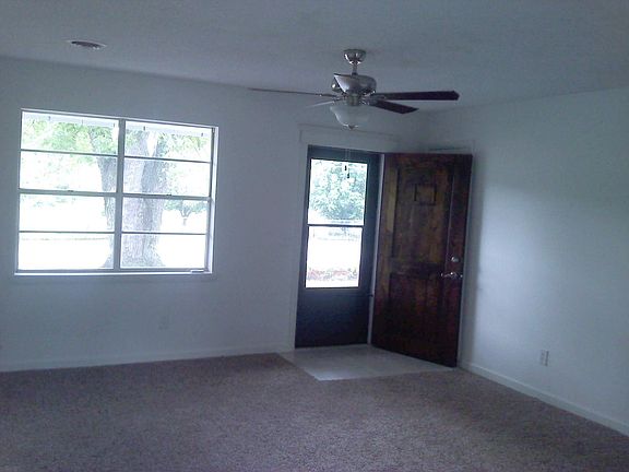 Living Room with Ceramic Tile Entry and New Carpet