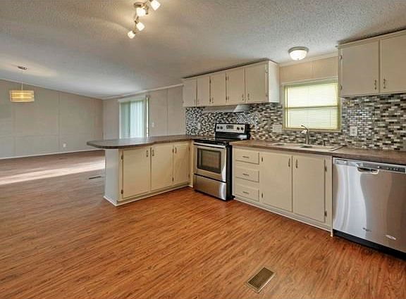 Kitchen features all new stainless steel appliances