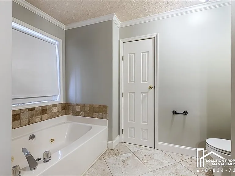 4929 Baker Plantation Way — Photo 15