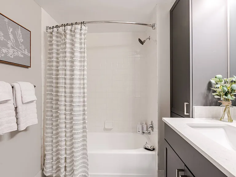 Shower and soaking tub at 15 Bank Apartments in White Plains, NY 10606