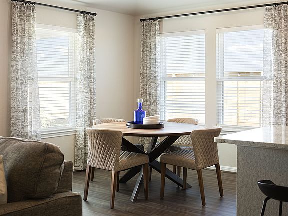 The cozy dining area is a great space open to the kitchen and great room.