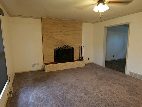 Living room leading into the dining room.