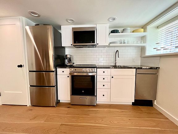 All new appliances including Breville espresso machine.