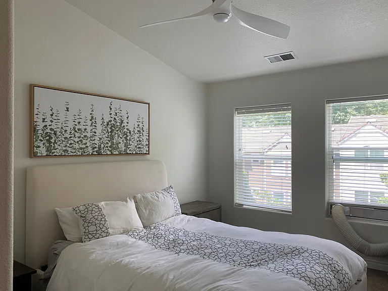 Master Bedroom with walk in closet and master bathroom.
