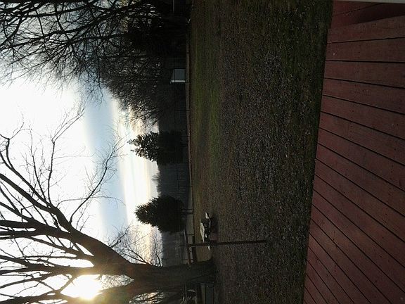 Fenced in Yard with Deck
