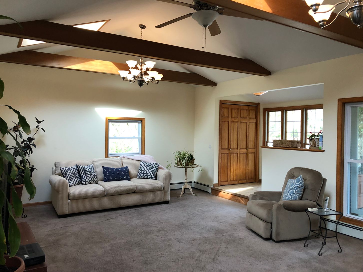  Enter the into the large living room that has sliding glass doors that take you to the back deck. 