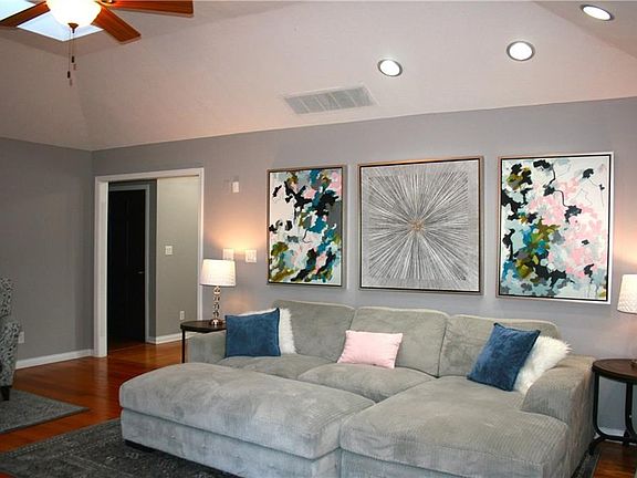 All oak trim has been recently sanded and painted white, and all solid oak doors have been planted a dark charcoal gray.  It makes this 1989 built home feel so much fresher and more modern.