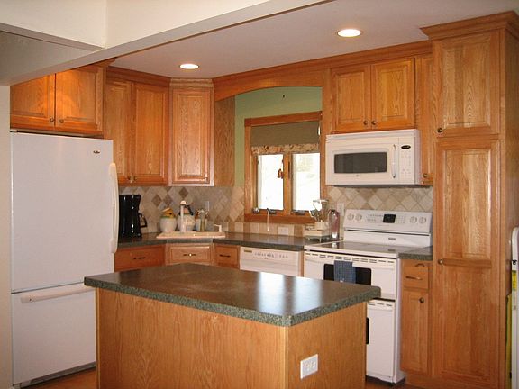 Updated Kitchen w/ Custom Oak Cabinets