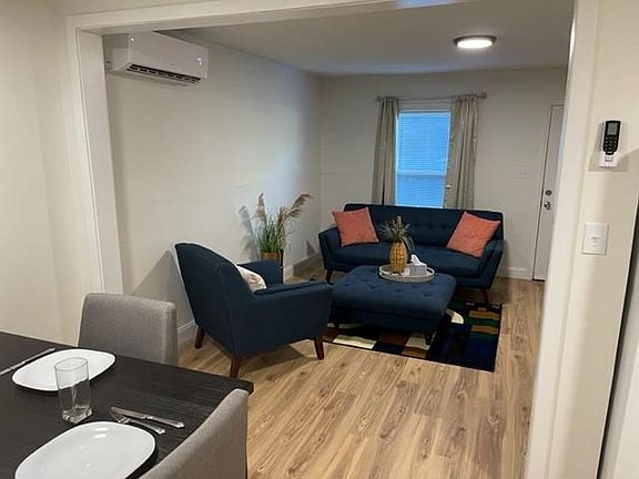 Open floor plan living room & eat-in kitchen