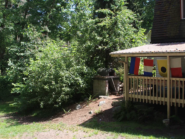 Covered Porch with outdoor Pizza Oven and Sink