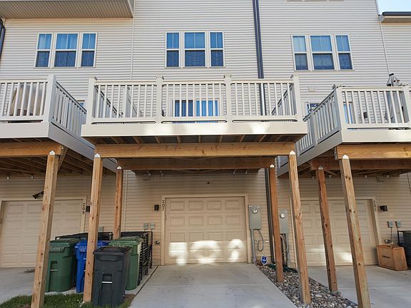 Back of House - Garage and Driveway