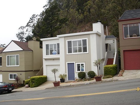 Detached, two entrances, no rear neighbors!