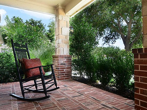 The essence of "home" is found here on the covered front Porch that is impressive in both length and