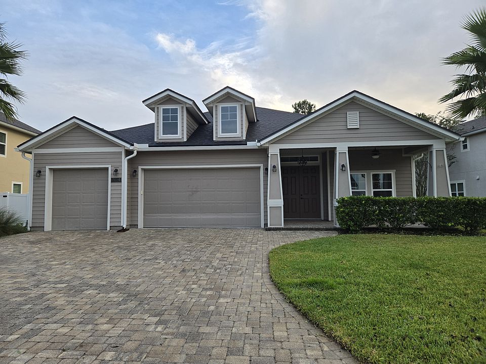Three car garage with automatic openers on both doors