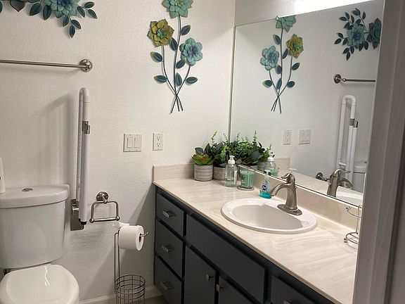 Hall bathroom. Shower/tub combo. New tile.