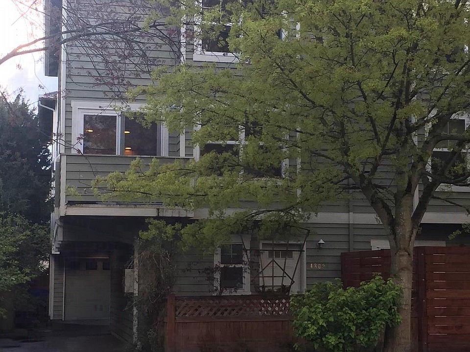 Exterior photo with driveway to garage