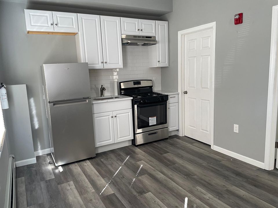 Kitchen looks into Living Room!